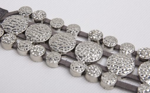 A fun on trend grey suede 4 strand cuff with press stud adjustable fastening
