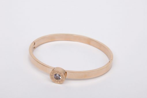 Limited Edition: Gold Bangle comes with 4 different coloured interchangeable stones