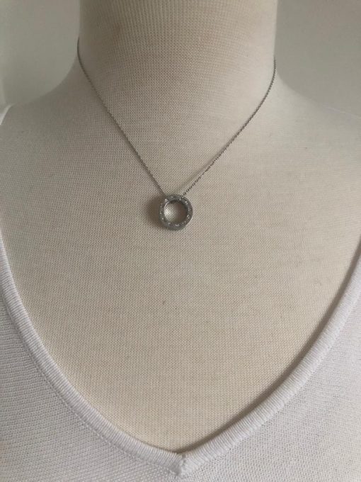 Silver Hollow Disc Necklace with Crystal Diamond Side Detail. - Image 4