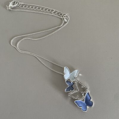 Silver Necklace with Blue, Diamante and Silver Butterfly drop Pendant